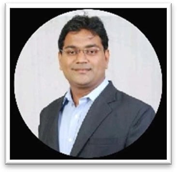 Professional headshot of Mr. Sachin M. Gogave, Founder of Sachin Gogave & Co LLP wearing a dark blazer and light blue shirt